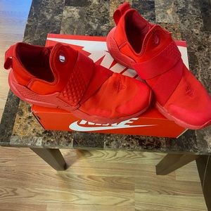 Red Nike Huraches size 7 Youth but will fit 8.5/9 Women. Gently worn